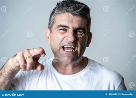 Portrait Of A Mature 40s To 50s White Angry And Upset Man Looking