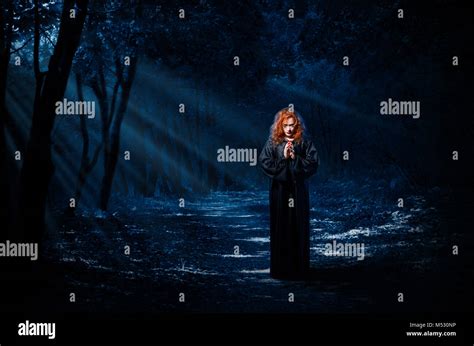 Person In Dark Forest Hi Res Stock Photography And Images Alamy