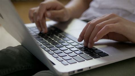 Close Up Of Female Hands Typing On The Laptop Keyboard Stock Video