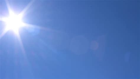 Sun Moving Across The Clear Blue Sky Hd 1080 Stock Footage Video