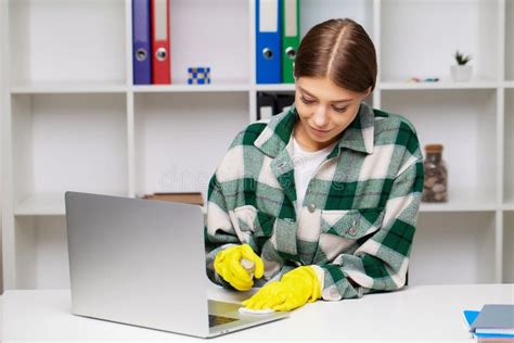 An Employee Of The Cleaning Company Fulfills Orders For Office Cleaning
