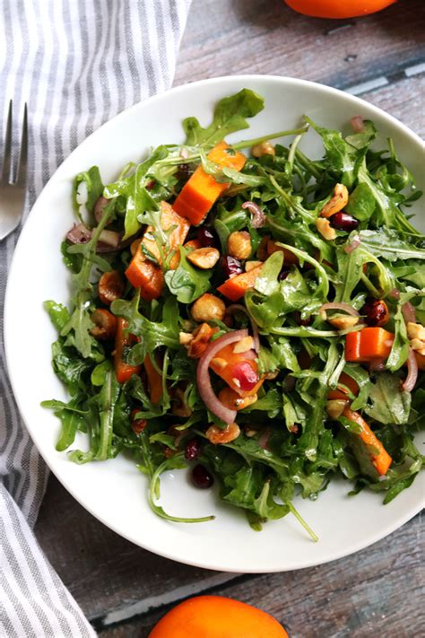 Persimmon And Pomegranate Salad With Arugula And Hazelnuts Joanne