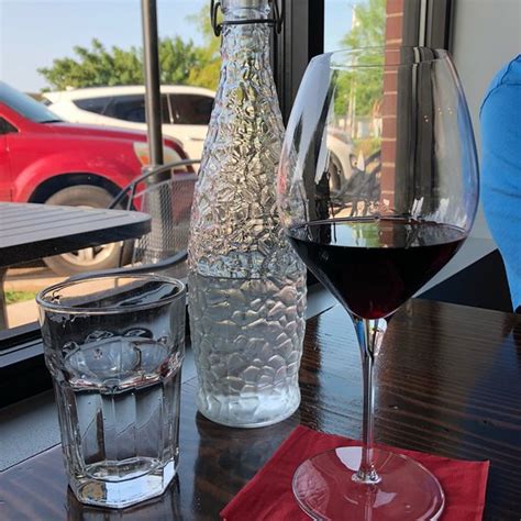 Enjoy a nice cup of coffee in this whimsical mug. Ellis Island Coffee and Wine Lounge, Edmond - Restaurant ...