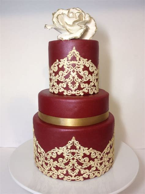 Unable to complete your request at this time. Burgundy and gold wedding cake with sugar lace and gold ...