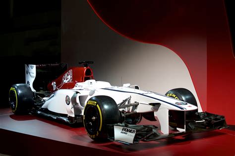 The fast race is the one you'll watch on tv or in person, and the slow one is the race between technological development and the rules. Check out Alfa Romeo's Ferrari-powered Formula 1 race car