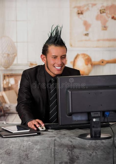 Close Up Of Smiling Office Punk Worker Wearing A Suit With A Crest