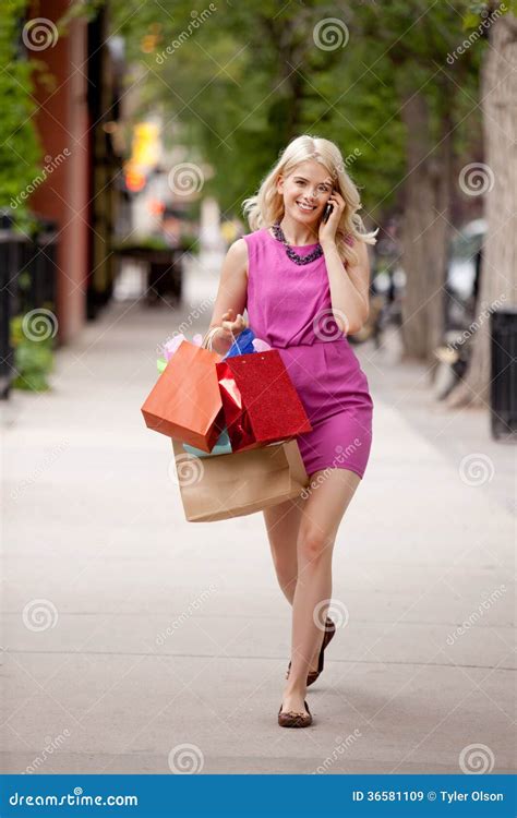 Attractive Blond Woman Walking Down Street Stock Image Image Of