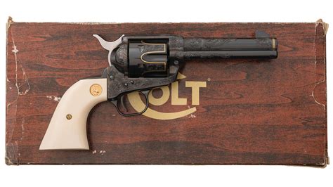 Engraved Gold Inlaid Colt Single Action Army Rock Island Auction