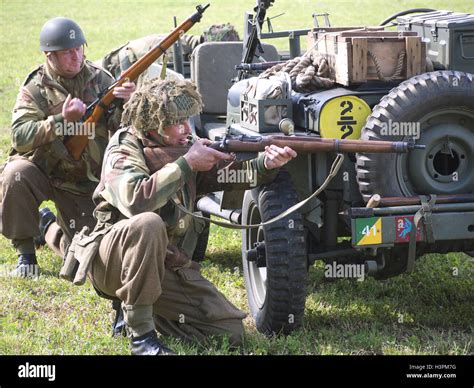 Reenactors Portraying British World War Two Soldiers During A Battle