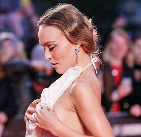 Braless Lily Rose Depp Prevents Nip Slip Wardrobe Malfunction At The King Premiere Amalito