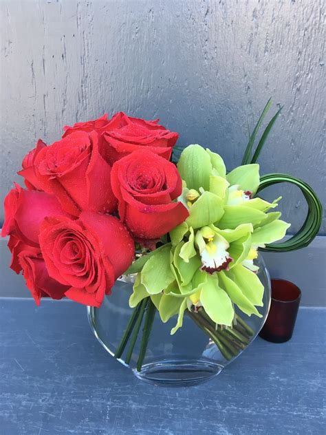 Dozen Rose And Cymbidium Orchid Special In Los Angeles Ca La Fleur By Tracy