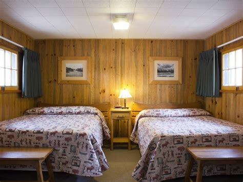 Old Faithful Snow Lodge Frontier Cabin Two Beds 01 Yellowstone