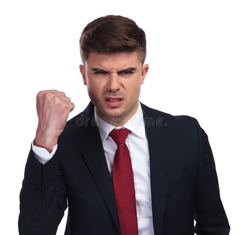 Portrait Of Angry Businessman Shaking His Fist In The Air Stock Image
