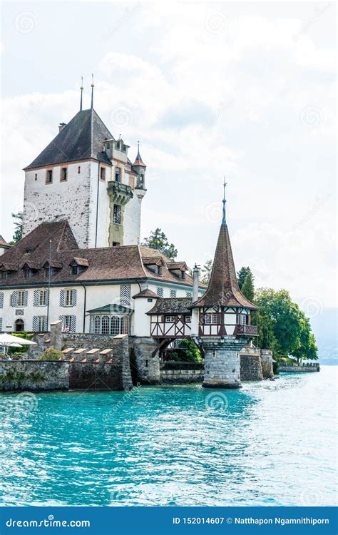 Oberhofen Castle With Thun Lake Background In Switzerland Stock Image