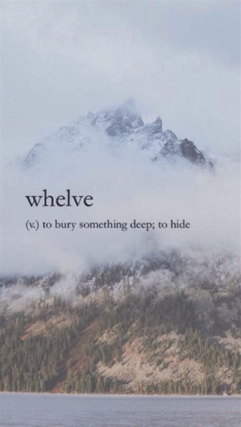 The Words Whelve Are Written In Front Of A Mountain With Trees On It
