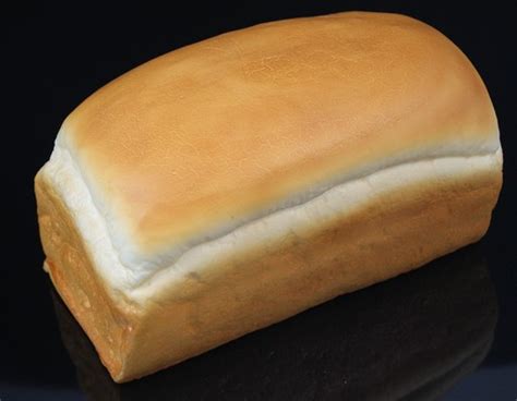 A loaf of bread is usually made in a standardized lo. Fake Food Bread Of White Loaf