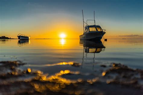 100 Free Photos Sunset Behind Fishing Boats In Albion Bay