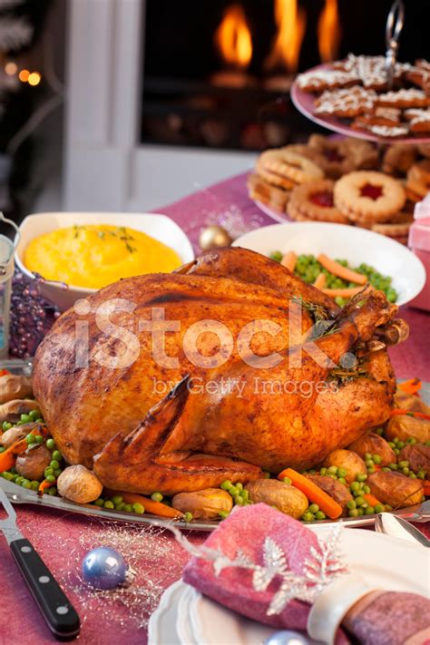 Holiday Dinner With Stuffed Turkey And Side Dishes Stock Photos