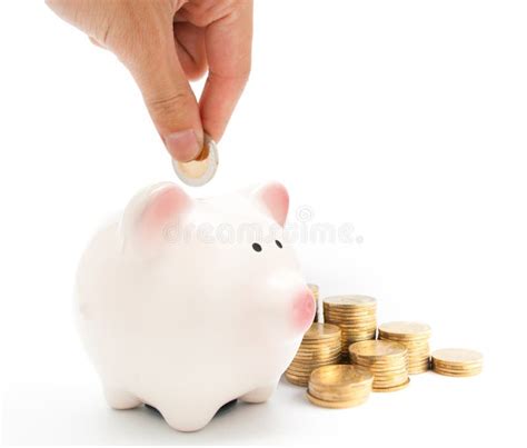 Hand Putting A Coin Into Piggy Bank Stock Photo Image Of Beautiful