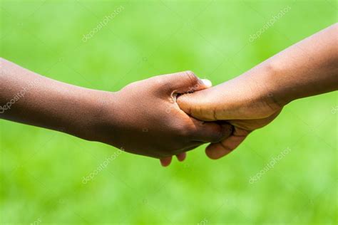 Detail Of African Kids Holding Hands Stock Photo By ©karelnoppe 64619629