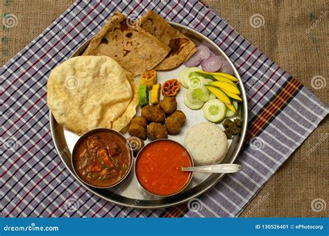 Authentic Maharashtrian Lunch Thali With Amras And Poli India Stock