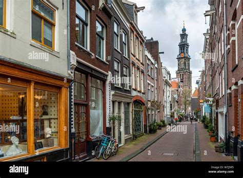 Street With Brick Houses View Of Westerkerk Church Tower Jordaan