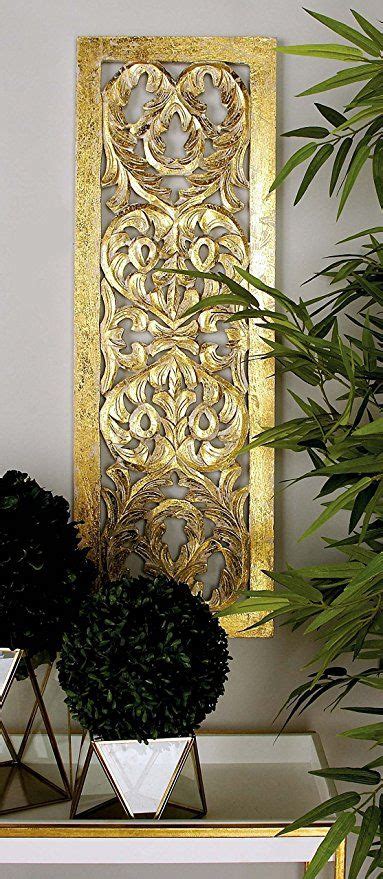Check spelling or type a new query. Amazon.com: Deco 79 96069 Wood Wall Panel, 12" x 36", Gold: Home & Kitchen | Carved wood wall ...