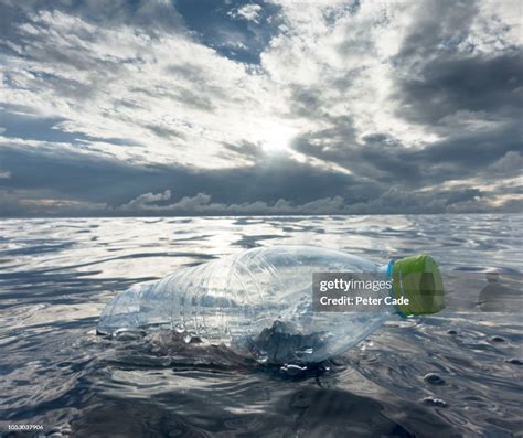 Plastic Bottles Floating In Ocean High Res Stock Photo Getty Images