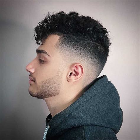 That wavy fringe can be textured and styled with light hair wax products for a natural, matte finish. 16 Awesome Examples of Curly Hair Fade Haircuts - Latest ...