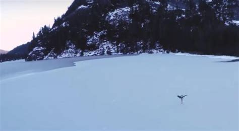 Champion Figure Skater Glides Across Frozen Canadian Lake In Stunning