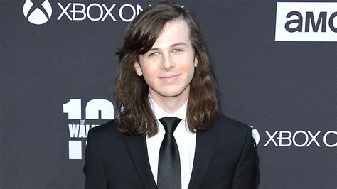 Twds Chandler Riggs Cuts Off Mullet As Character Faces Gruesome Fate