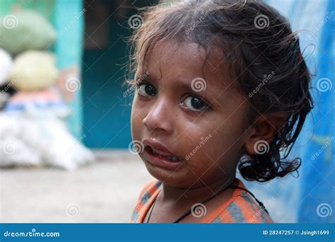 Closeup Of A Poor Child Crying From New Delhi India Editorial