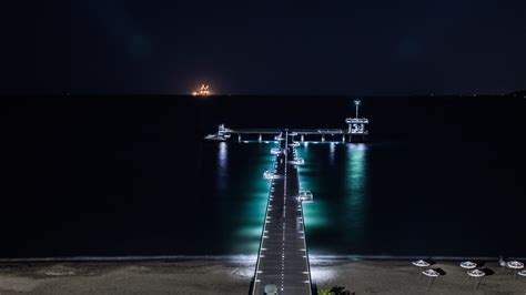 Free Images Sea Pier Night Water Light Sky Architecture Line