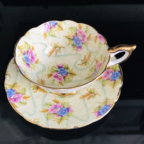 royal-standard-tea-cup-and-saucer-england-fine-bone-china-chintz-floral-bright-pink-and-blue