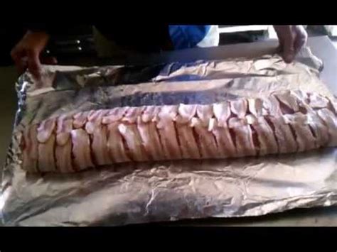 This bacon wrapped pork loin roast is brushed with a sweet and savory glaze, then covered in bacon and grilled to perfection. traeger bacon wrapped pork loin.avi - YouTube