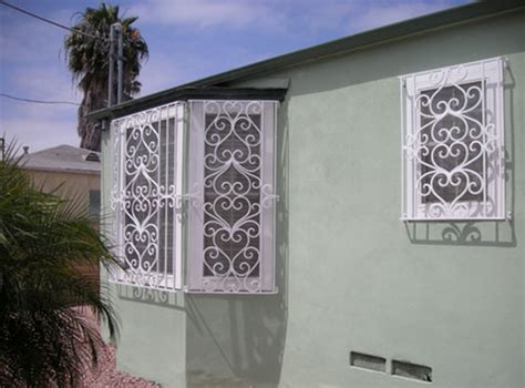 The decorative metal window guards that are offered here are durable enough and their sturdiness assists them in lasting for a long time. Wrought Iron Security Window Bars - San Diego, CA | Fire ...