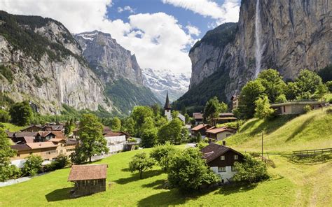 Lauterbrunnen The Valley Of Waterfalls And Steep Cliffs In Switzerland
