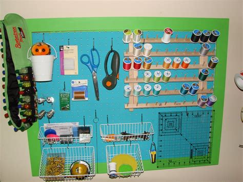 If you need more ideas on what to put on your craft pegboard, check out my ultimate pegboard organization guide for craft rooms. By Your Hands: Sewing Room Organization - Pegboard