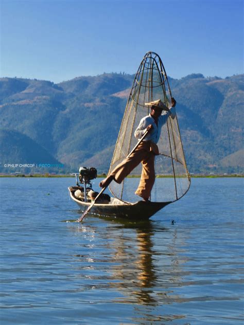 BALANCING ACTS peaceful on tranquil waters, mesmerized, I watch: an