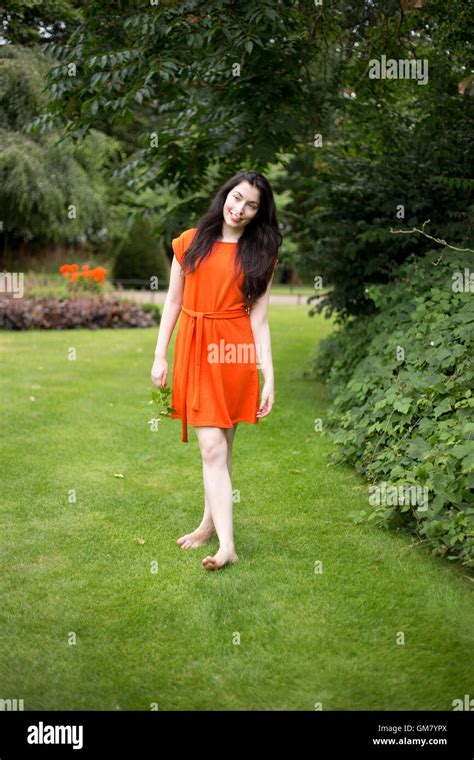Woman Walking Barefoot Grass Garden Hi Res Stock Photography And Images