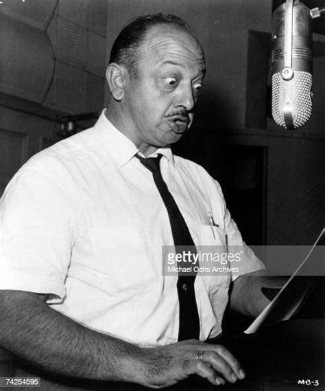 Radio And Cartoon Voice Actor Mel Blanc In The Recording Studio Poses