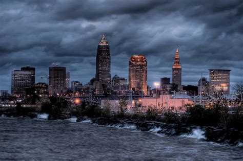 Cleveland Skyline At Dusk From Edgewater Park Photograph By At Lands