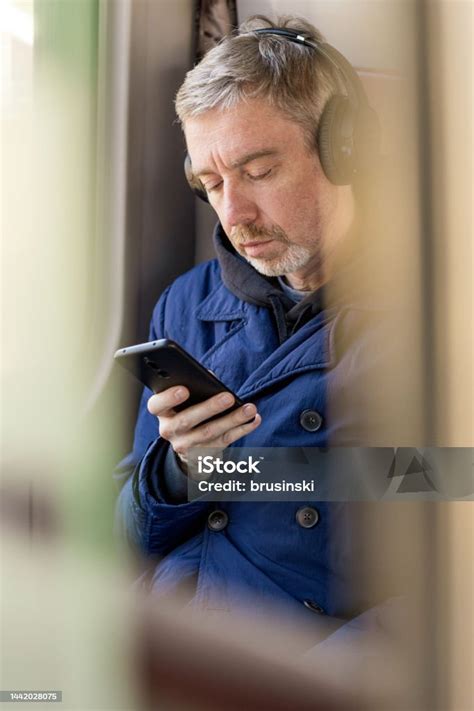50 Year Old White Male Travels On A Train Stock Photo Download Image