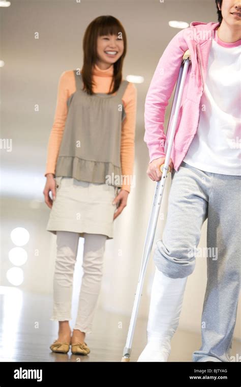 Man On Crutches In The Hospital Stock Photo Alamy