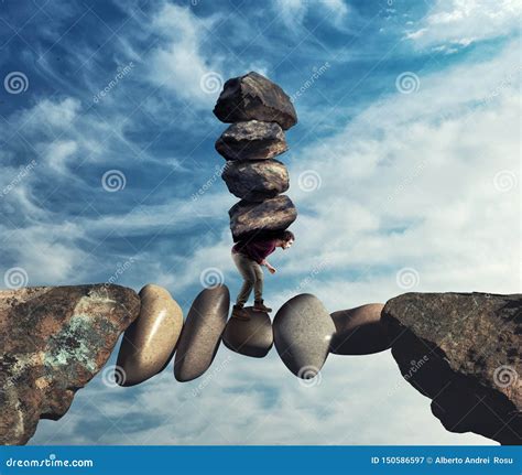 Man Carries A Stack Of Stones On A Unstable Path Between Stock Image