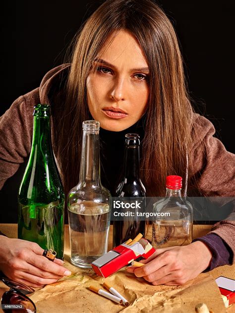 Drunk Girl Holding Bottle Of Vodka Stock Photo Download Image Now