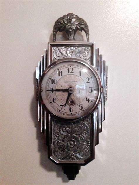 Clock hanging on wall ticking showing twelve hours. Clocks - Decor : Art Deco Manning Bowman wall clock ...