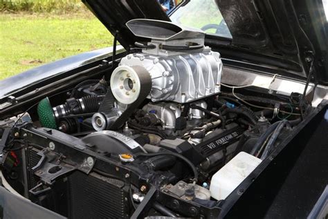 Mad Max Supercharger Bolted Onto A V8 Engine Ford Falcon Right Hand