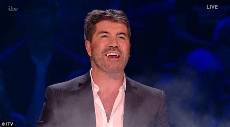 Simon Cowells Fake Fangs Raise Giggles From The X Factor Audience
