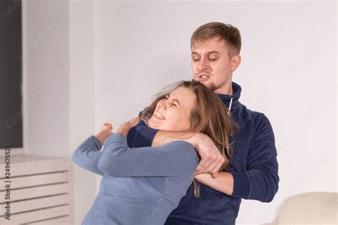 Man Beating Woman
